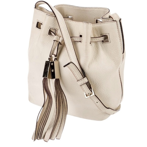 kate spade Handbags - Kate Spade Cream/Beige 100% Cow Leather Shoulder Bag with Tassel